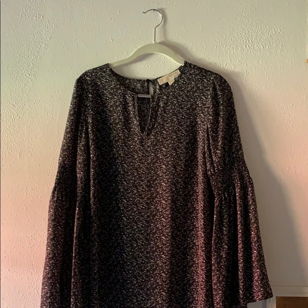 Michael Kors peplum sleeve shirt.